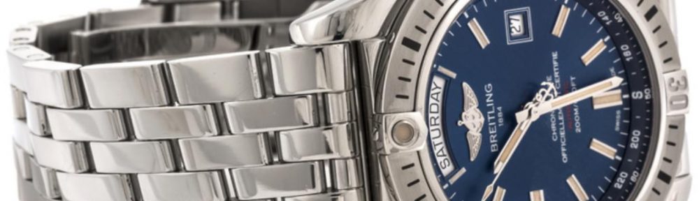 The stainless steel fake watch has a day window.