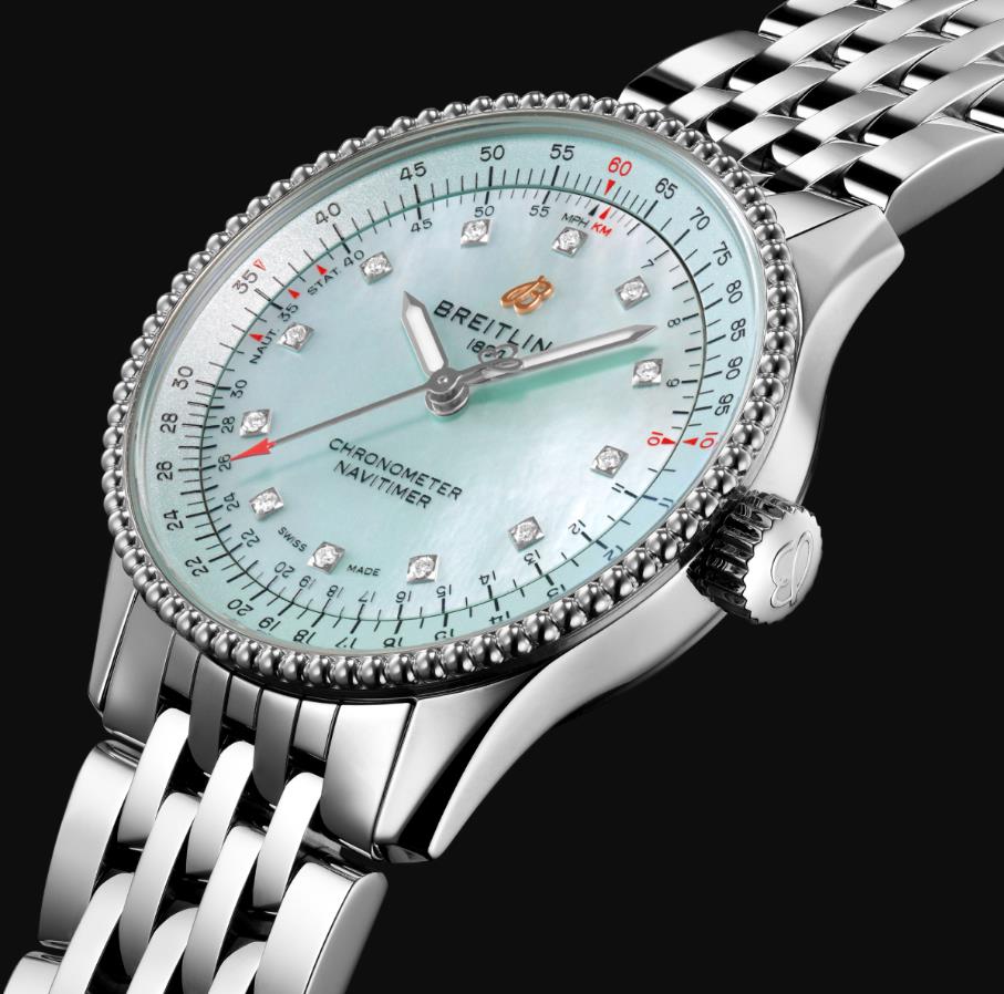 The lake blue dial fake watch has diamond hour marks.